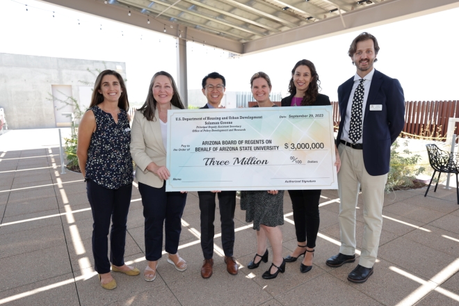 The core ARCHES team celebrates receiving a $3 million grant from the U.S. Department of Housing and Urban Development.