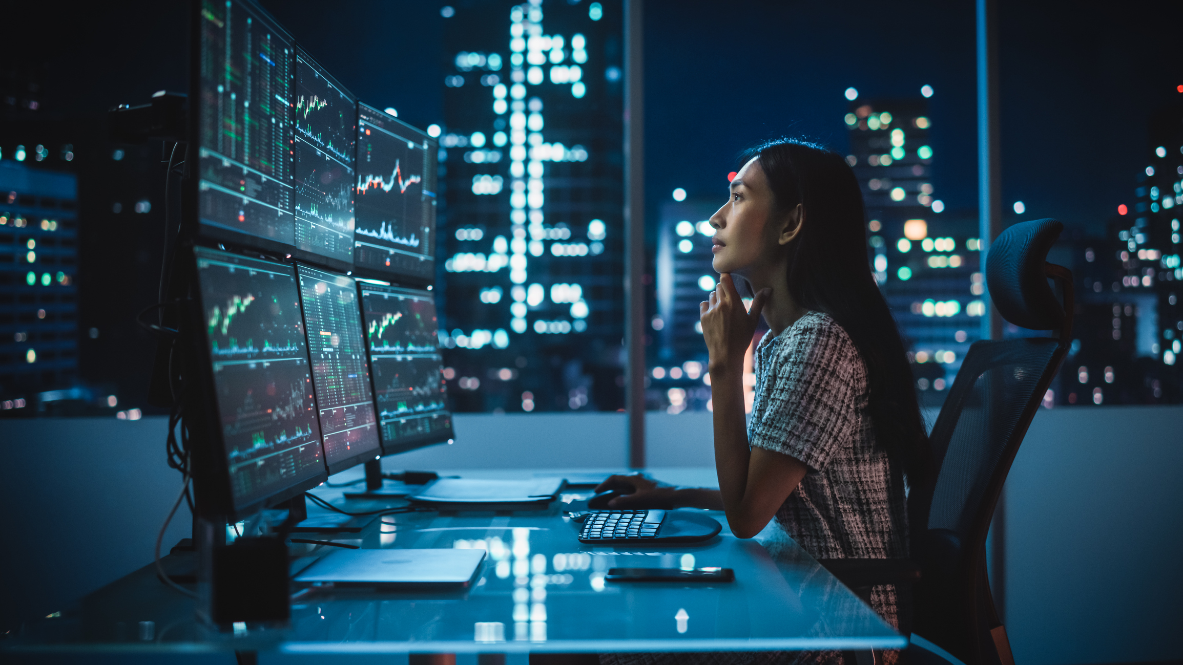 Woman looking at computers