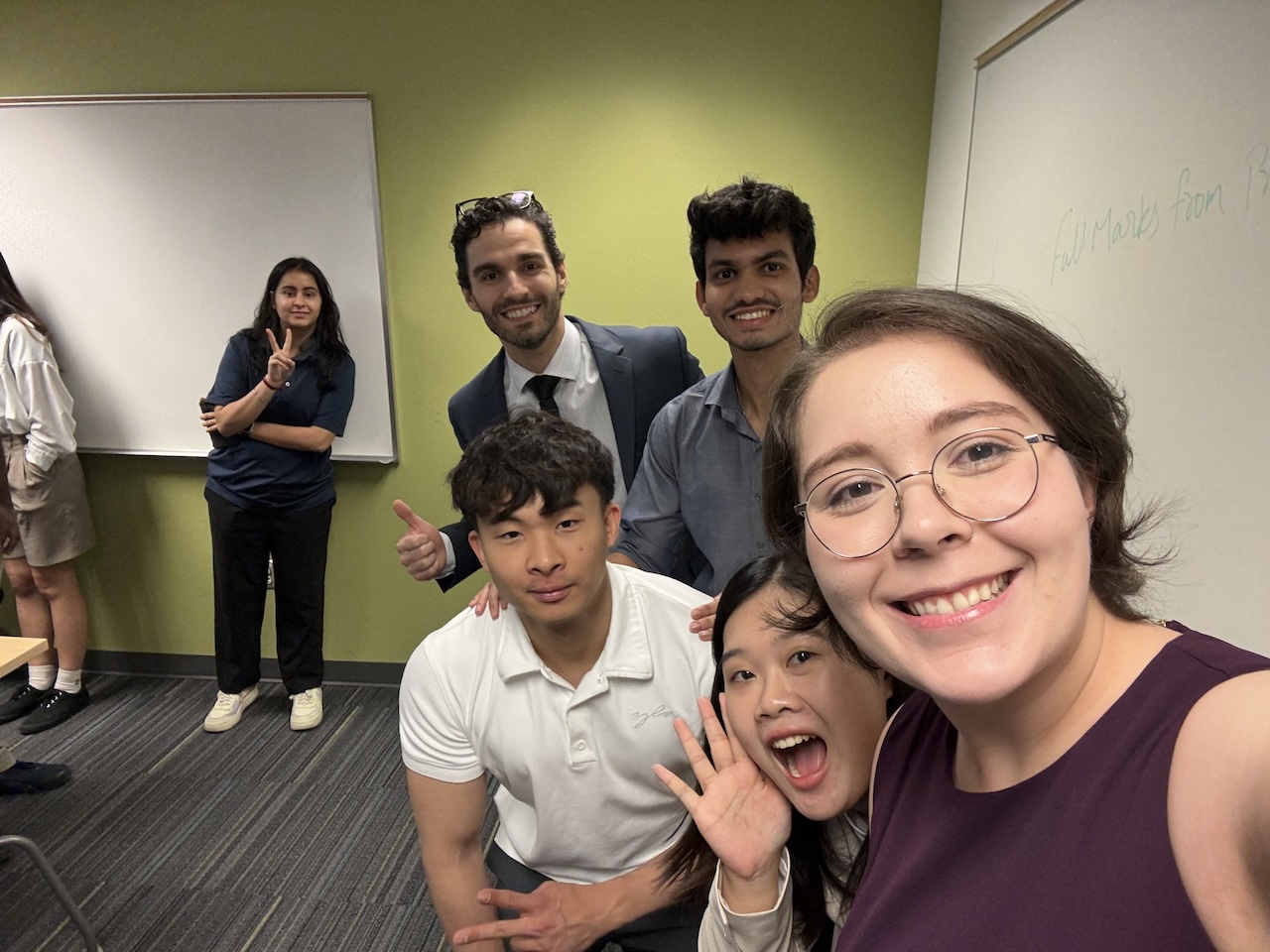 MS-SCM student Bethany Farmer with fellow students in a classroom